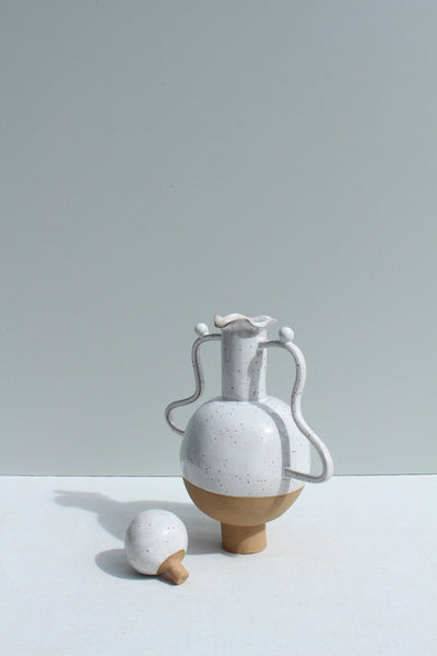 White Vessel with a Wiggle Handle and Stopper