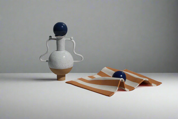 White Vessel with a Wiggle Handle and Stopper