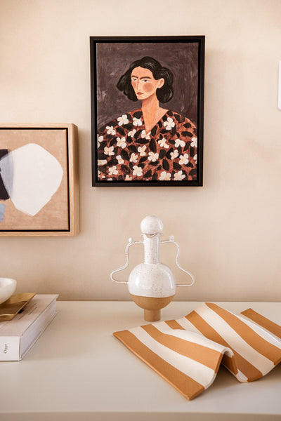 Styled image of White Vessel with a Wiggle Handle and Stopper