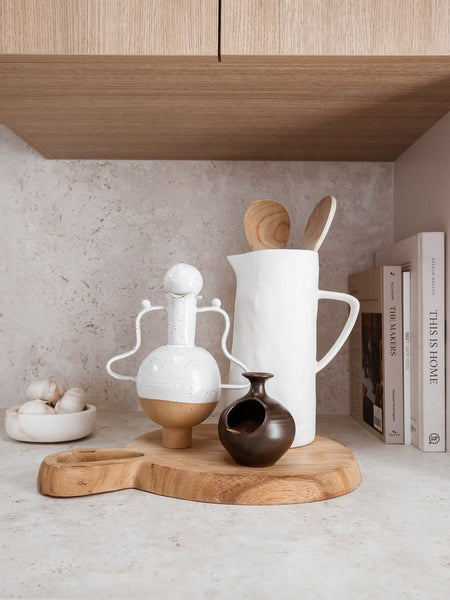 White Vessel with a Wiggle Handle and Stopper