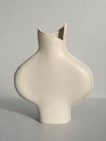 Cream Vessel with Seams