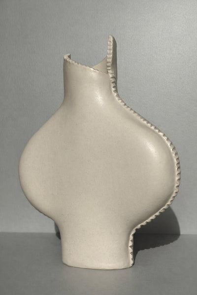 Cream Vessel with Seams