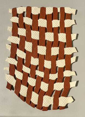 Woven pattern of brown and beige strips on a plain background