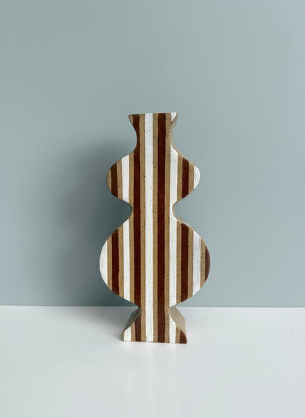 brown and white striped wavy vessel