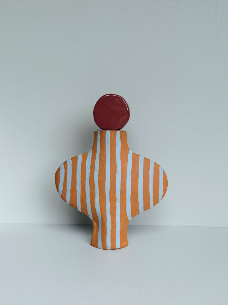 Blue Striped Terracotta Vessel with a Burgundy Stopper