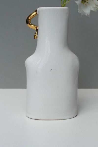 SECOND - Simply porcelain with a gold handle