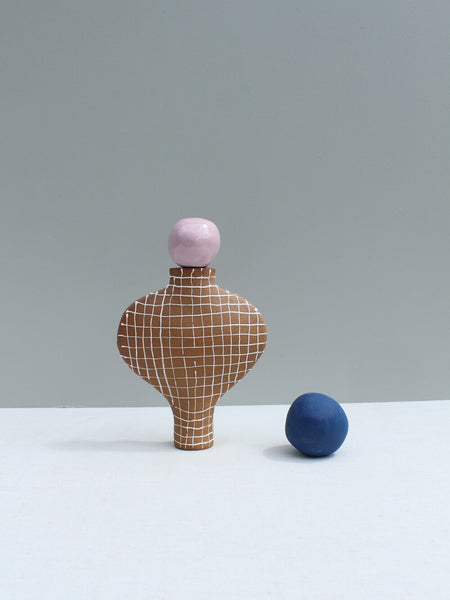 END OF LINE 40% Off Terracotta White Grid Vessel with a Blue Stopper