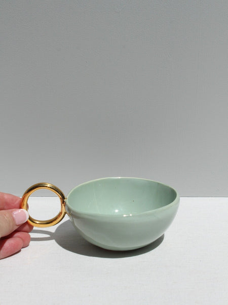 With Pleasure - Gold Handled Sage Green Cup.