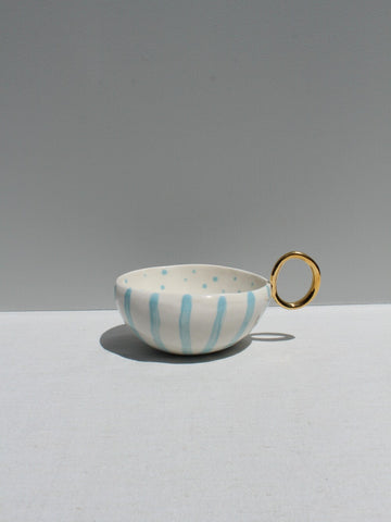 With Pleasure - Gold Handled Light Blue Striped Cup.