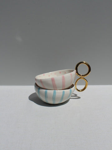 Set of Two Gold Handled Pink and Light Blue Cup.