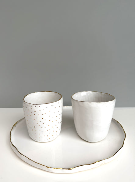 Gold Rimmed White Tumbler with spots