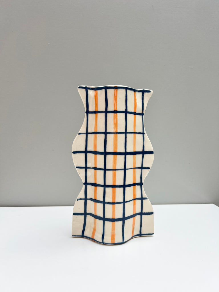 Orange and Dark Blue Oscillate Vessel